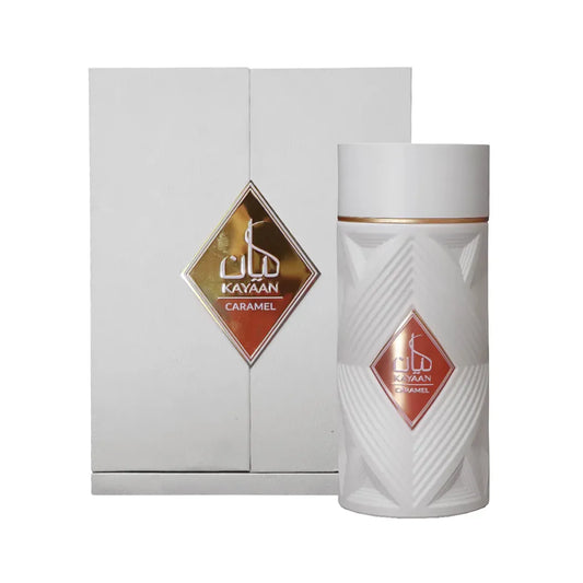 Perfume Armaf Kayaan Caramel Ansam 100ml Edp con frasco color ámbar y detalles dorados sobre fondo blanco