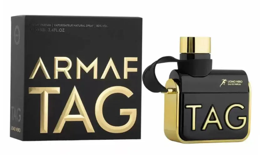 Fragancia Tag Uomo Nero Armaf hombre EDP 100 ml perfume de larga duración con esencia de cardamomo vainilla y ámbar perfecto para hombres que buscan sofisticación y carácter
