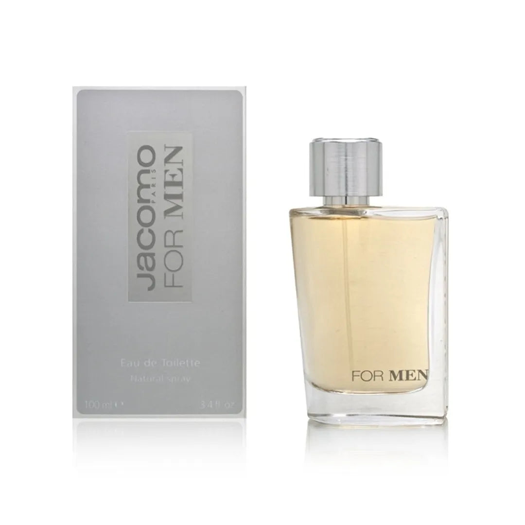 detalle cercano del frasco del perfume jacomo for men resaltando el tapón metálico y la transparencia del vidrio