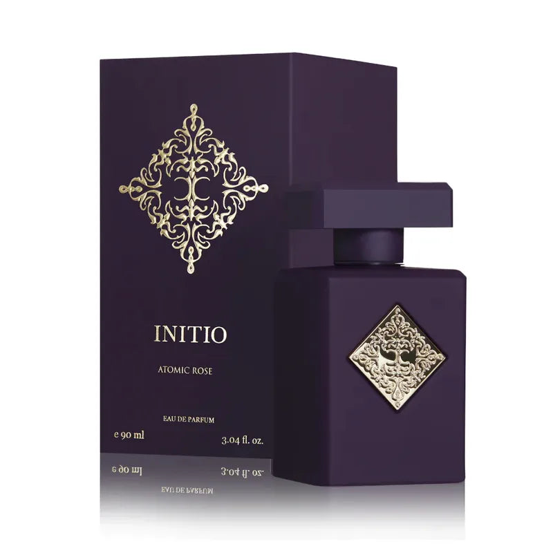 perfume initio atomic rose en frasco rojo intenso con detalles metálicos