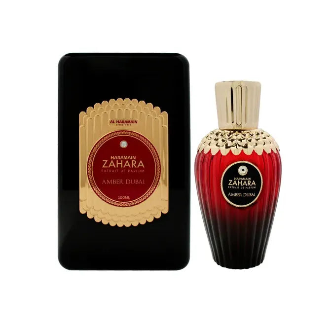 perfume zahara amber dubai al haramain en frasco dorado con detalles árabes y tapa negra