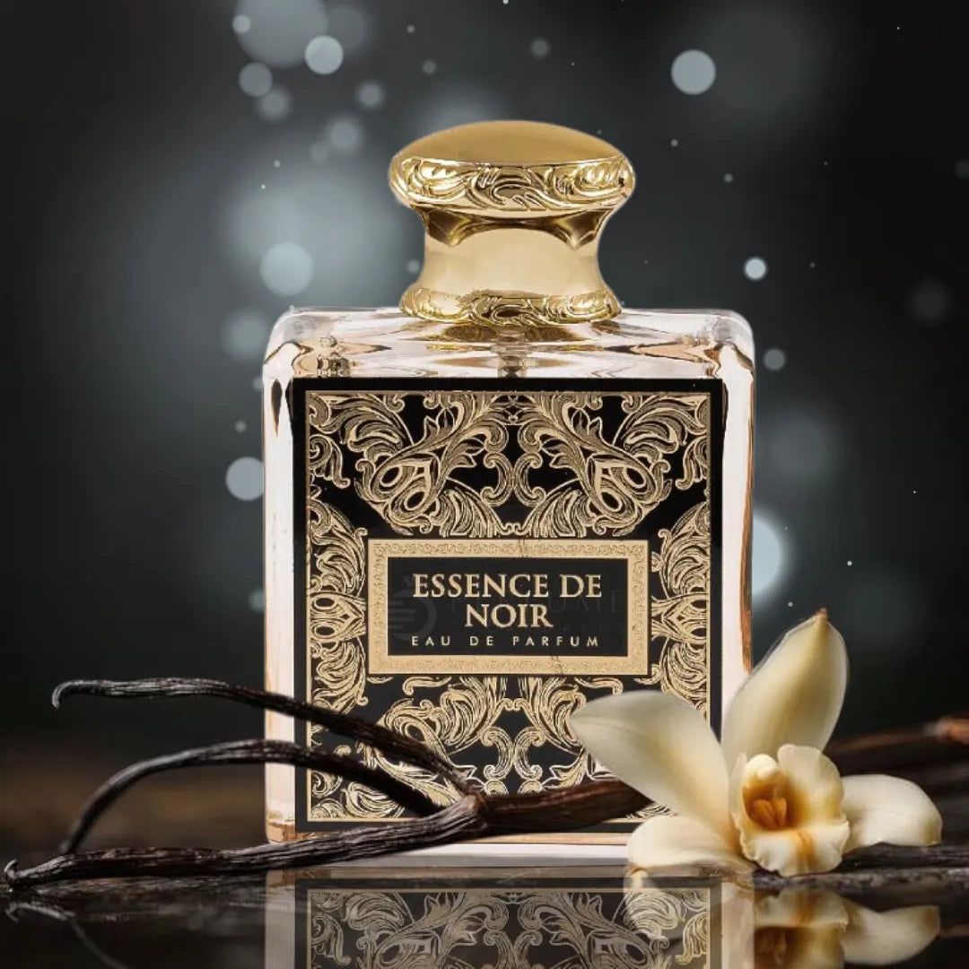 Detalle del frasco Essence De Noir French Avenue resaltando el tapón metálico y el grabado del nombre en la etiqueta