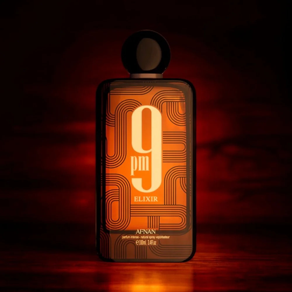fotografía del perfume afnan 9 pm elixir parfum intense destacando su esencia ámbar vainilla y carácter intenso