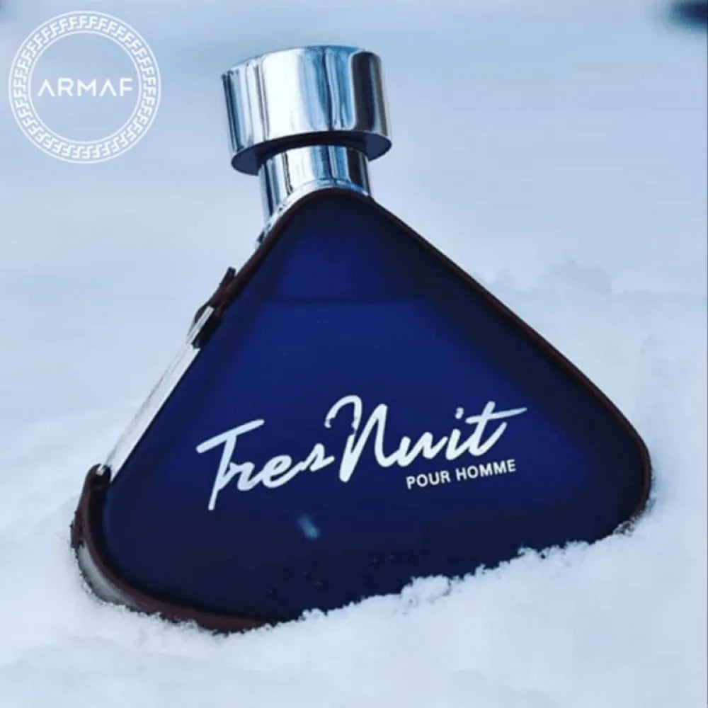 imagen del perfume tres nuit pour homme sobre fondo neutro destacando su familia olfativa amaderada aromática