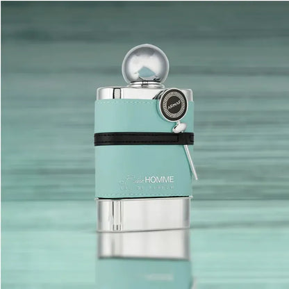 foto del perfume blue homme armaf 100 ml mostrando su presentación sofisticada y su esencia fresca