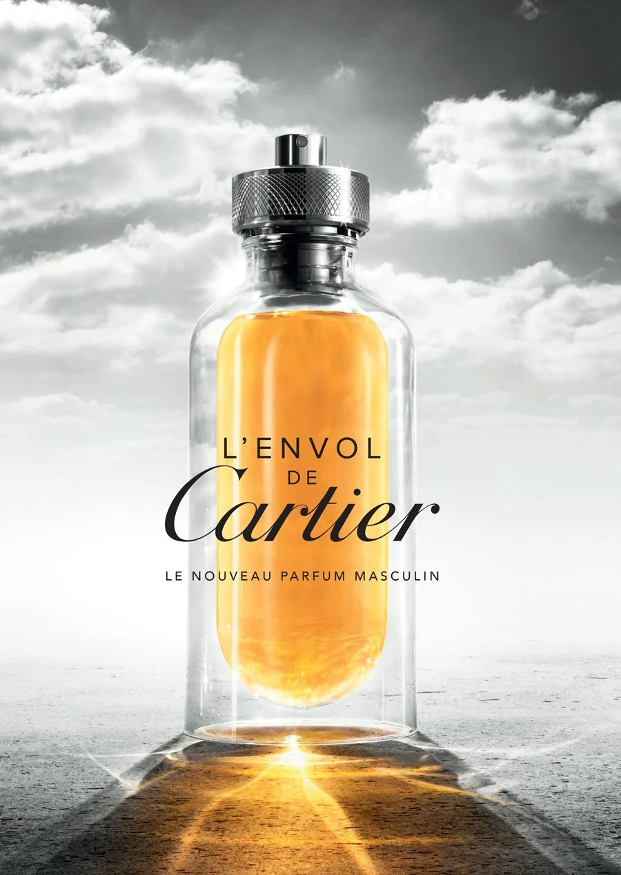 perfume cartier lenvol eau de toilette 100 ml para hombre con frasco transparente y detalles metálicos sobre fondo blanco