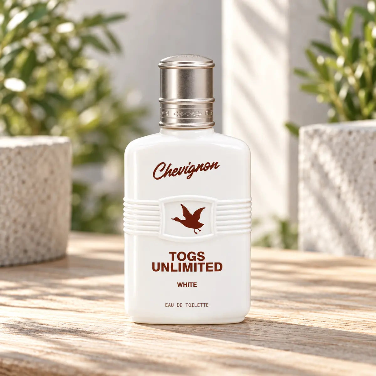 Presentación de Chevignon Togs Unlimited White EDT 100 ml para hombre con vaporizador
