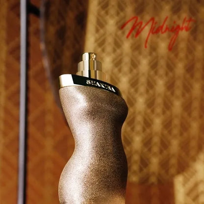imagen del perfume dance star midnight by shakira sobre fondo claro destacando su presentación femenina y moderna