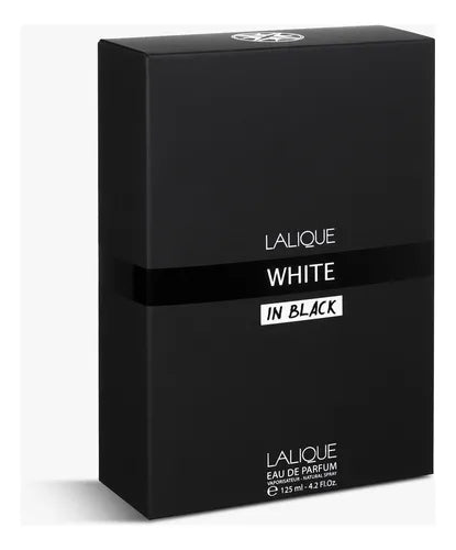 Detalle de la tapa negra Lalique y atomizador del perfume
