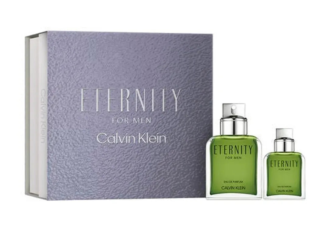 Estuche Calvin Klein Eternity for men eau de parfum Hombre 100ml con perfume y productos complementarios sobre fondo blanco