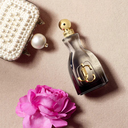 imagen de la caja del perfume i want choo forever jimmy choo junto al frasco femenino