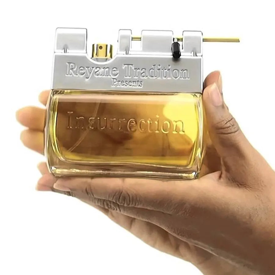 Frasco del perfume Insurrection Reyane Tradition diseño moderno masculino