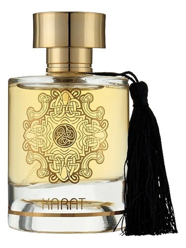 Fragancia unisex Maison Alhambra Karat con notas de azafrán sándalo y ámbar
