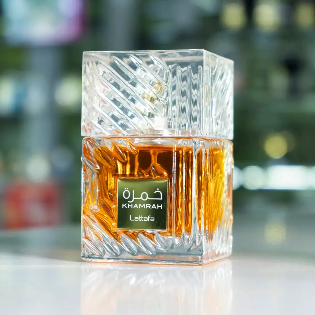 Frasco de Khamrah de Lattafa en presentación de 100 ml