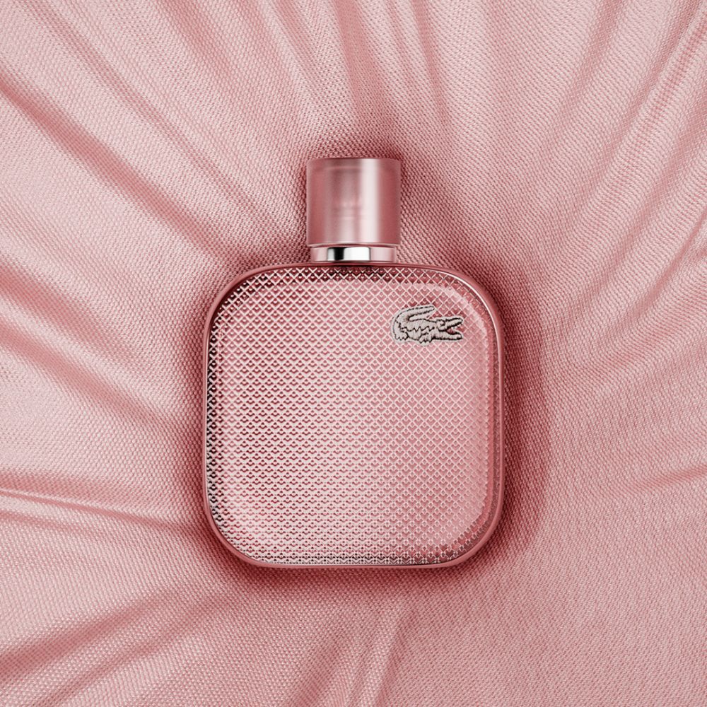 Vista lateral del perfume Lacoste Silver Rose L.12.12 Eau De Parfum Mujer 100 ml