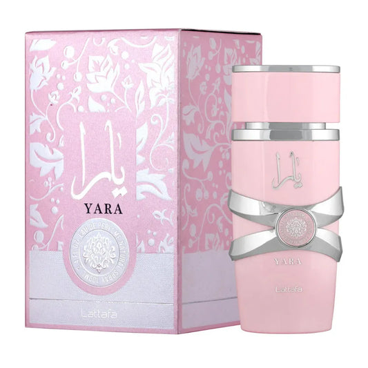 Perfume Lattafa Yara para mujer botella rosada de 100ml sobre fondo blanco con tapa dorada