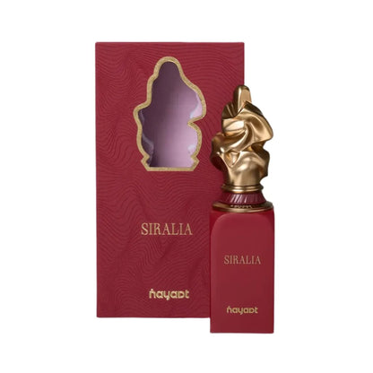 frasco y caja de nayaat siralia edp 90 ml unisex sobre fondo limpio