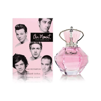 Frasco del perfume Our Moment One Direction 100 ml con diseño rosado y tapa decorativa