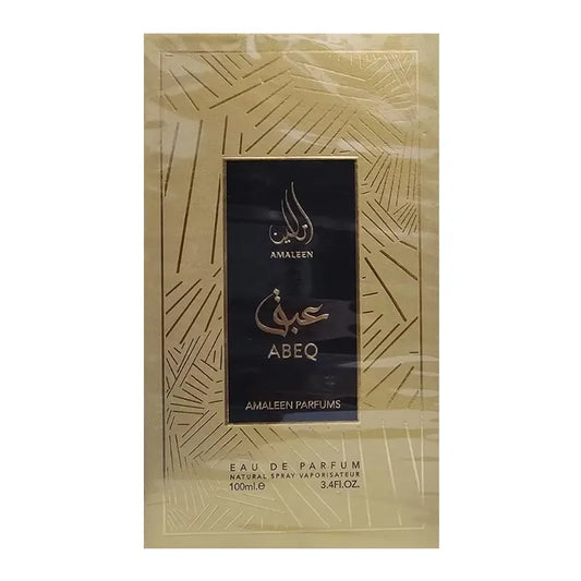 Botella negra elegante de perfume Abeq Amaleen con detalles dorados
