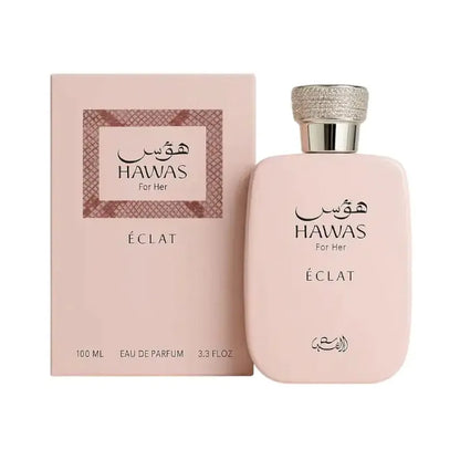 perfume hawas eclat rasasi para mujer en frasco rosa con detalles dorados y tapa dorada