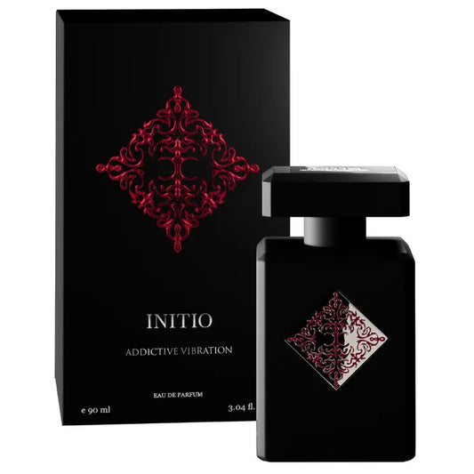 perfume initio addictive vibration en frasco morado con degradado y detalles dorados