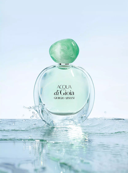 imagen del perfume giorgio armani acqua di gioia edp 100 ml representando su aroma floral acuático y sensación de frescura