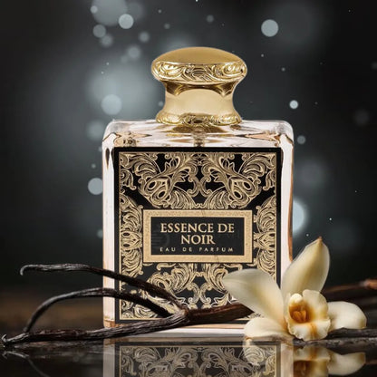 Detalle del frasco Essence De Noir French Avenue resaltando el tapón metálico y el grabado del nombre en la etiqueta