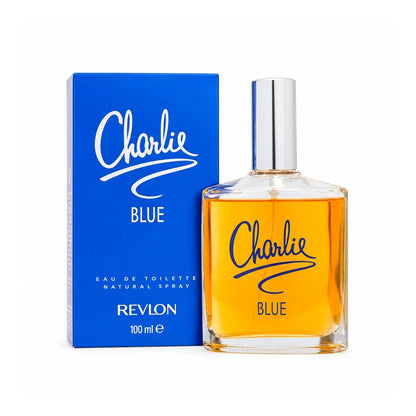 Perfume Revlon Charlie Blue EDT 100 ml para mujer, frasco transparente con líquido ámbar y caja azul sobre fondo blanco