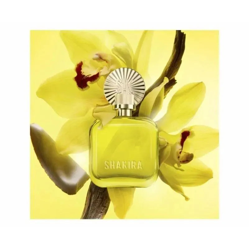 Perfume Shakira Amarillo EDP 80ml frasco solar con detalles dorados y etiqueta blanca