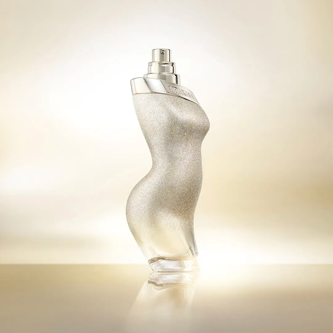 foto del perfume shakira dance star midnight resaltando su diseño curvo y elegante inspirado en la danza